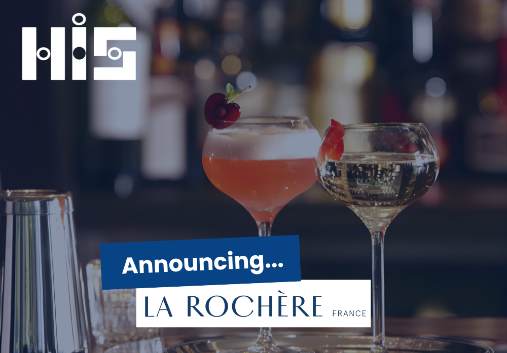 Glassware from La Rochere in a bar setting. Blog title overlapping image.